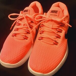 Nike Women's Neon Coral Sneakers